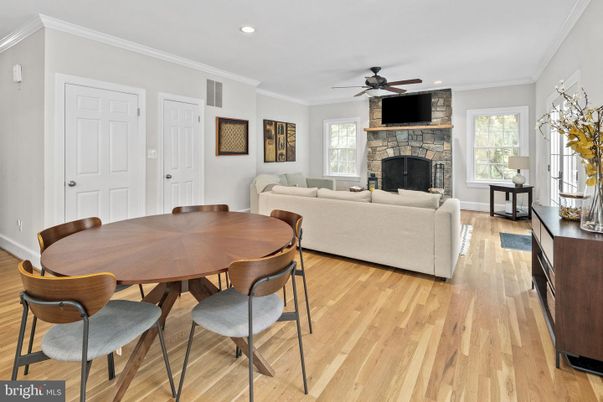 Dining room, Fireplace, Interior, Living room, Recessed Lighting, Wood Texture Flooring