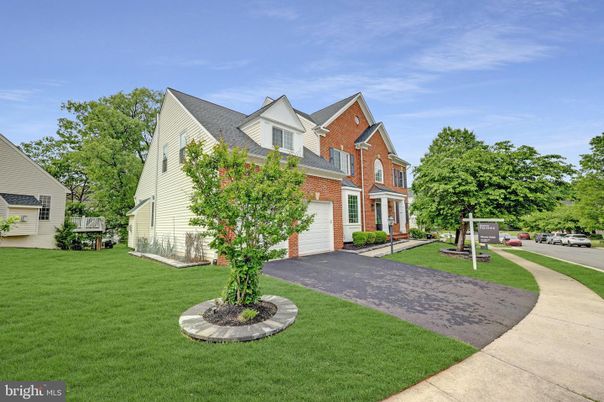 Attached, Backyard, Exterior, Facade, Brick Facade, Cape Cod