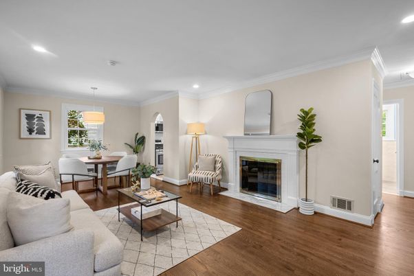Dining room, Fireplace, Interior, Living room, Pendant Lights, Recessed Lighting, Wood Texture Flooring