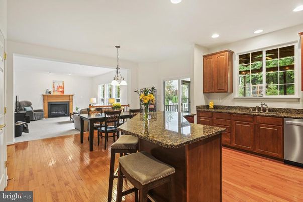 Dining room, Fireplace, Interior, Kitchen, Pendant Lights, Recessed Lighting, Wood Texture Flooring