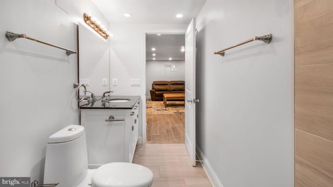 Bathroom, Dual Sink Vanities, Interior, Recessed Lighting, Wood Texture Flooring
