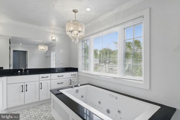 Bathroom, Chandelier, Dual Sink Vanities, Interior, Recessed Lighting