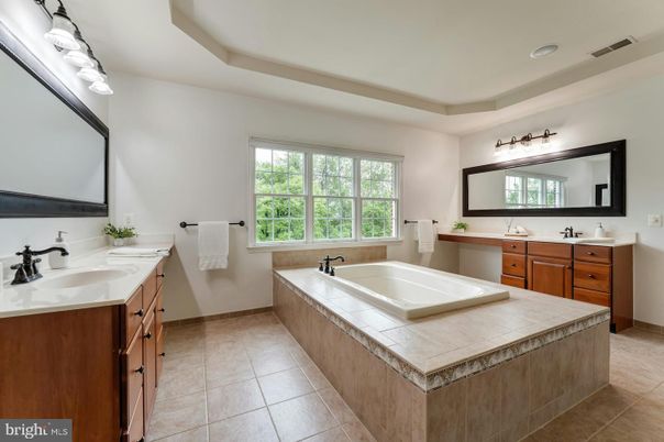 Bathroom, Dual Sink Vanities, Interior, Recessed Lighting, Tile Countertops