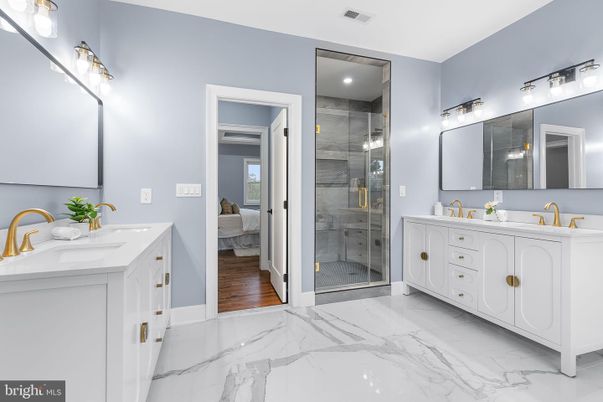 Bathroom, Dual Sink Vanities, Glass Shower, Interior, Marble, Recessed Lighting