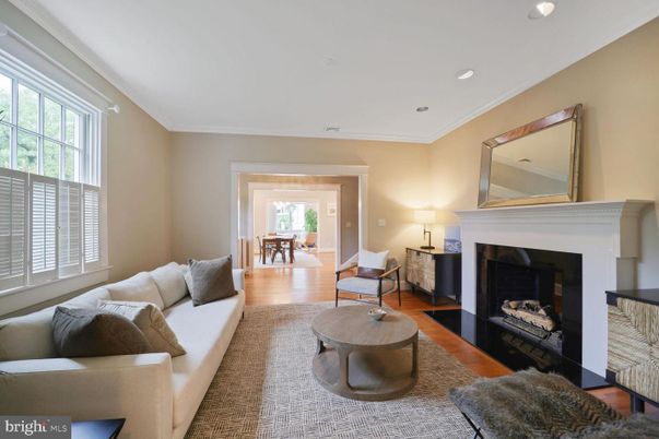 Dining room, Fireplace, Interior, Living room, Recessed Lighting, Wood Texture Flooring