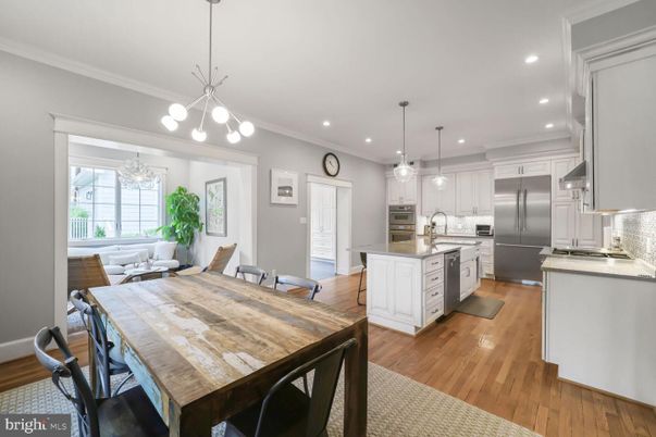 Dining room, Interior, Kitchen, Pendant Lights, Recessed Lighting, Stainless Steel Appliances, Wood Texture Flooring