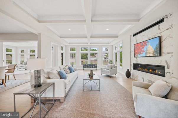 Dining room, Fireplace, Interior, Living room, Recessed Lighting, Wood Texture Flooring