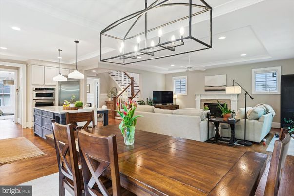 Dining room, Fireplace, Interior, Kitchen, Living room, Pendant Lights, Recessed Lighting, Stainless Steel Appliances, Wood Texture Flooring