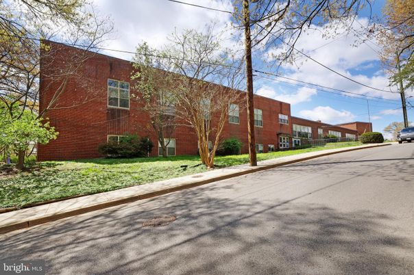 Exterior, Facade, Brick Facade, Condo Building