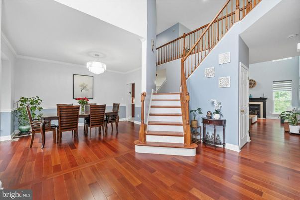 Chandelier, Dining room, Fireplace, Interior, Pendant Lights, Wood Texture Flooring