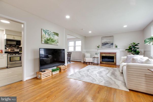 Fireplace, Interior, Kitchen, Living room, Recessed Lighting, Stainless Steel Appliances, Wood Texture Flooring