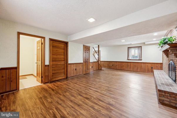 Empty room, Fireplace, Interior, Recessed Lighting, Wood Texture Flooring