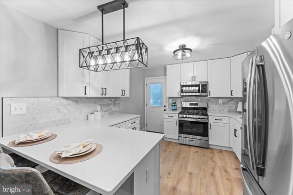 Interior, Kitchen, Pendant Lights, Stainless Steel Appliances, Wood Texture Flooring