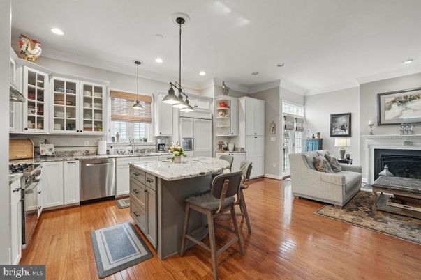 Fireplace, Interior, Kitchen, Living room, Pendant Lights, Recessed Lighting, Stainless Steel Appliances, Wood Texture Flooring