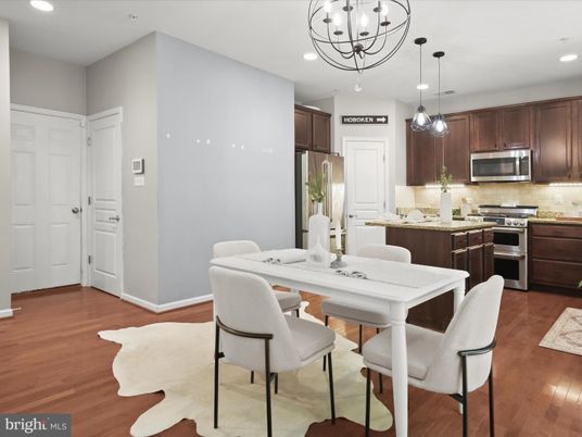 Dining room, Interior, Kitchen, Pendant Lights, Recessed Lighting, Stainless Steel Appliances, Wood Texture Flooring