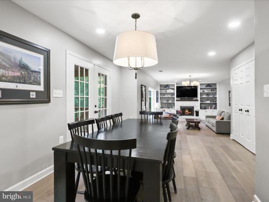 Dining room, Fireplace, Interior, Living room, Recessed Lighting, Wood Texture Flooring
