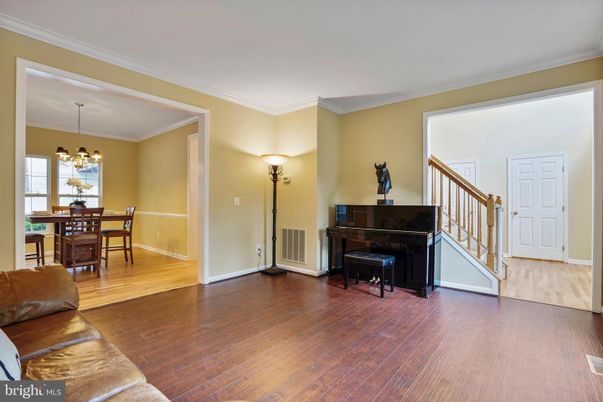 Chandelier, Dining room, Interior, Piano, Wood Texture Flooring