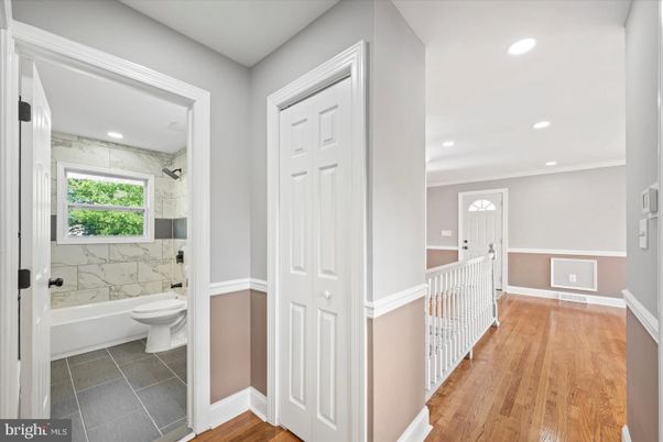 Bathroom, Interior, Marble Walls, Recessed Lighting, Wood Texture Flooring