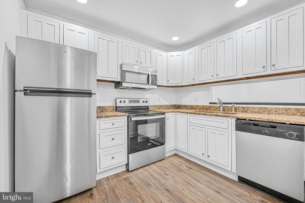 Interior, Kitchen, Recessed Lighting, Stainless Steel Appliances, Wood Texture Flooring