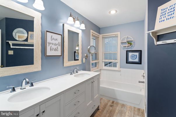 Bathroom, Dual Sink Vanities, Interior, Recessed Lighting, Wood Texture Flooring