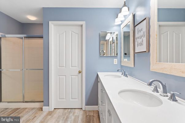 Bathroom, Dual Sink Vanities, Glass Shower, Interior, Wood Texture Flooring
