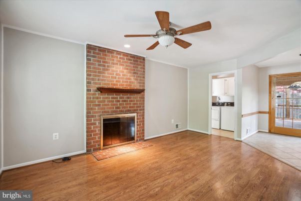Empty room, Fireplace, Interior, Recessed Lighting, Stone Walls, Wood Texture Flooring