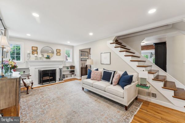 Fireplace, Interior, Living room, Piano, Recessed Lighting, Wood Texture Flooring