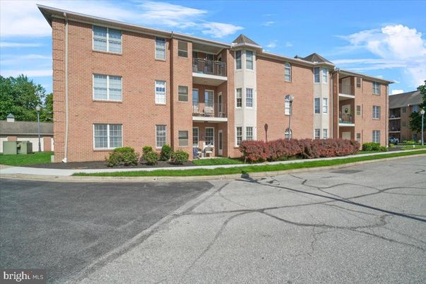 Exterior, Facade, Brick Facade, Condo Building
