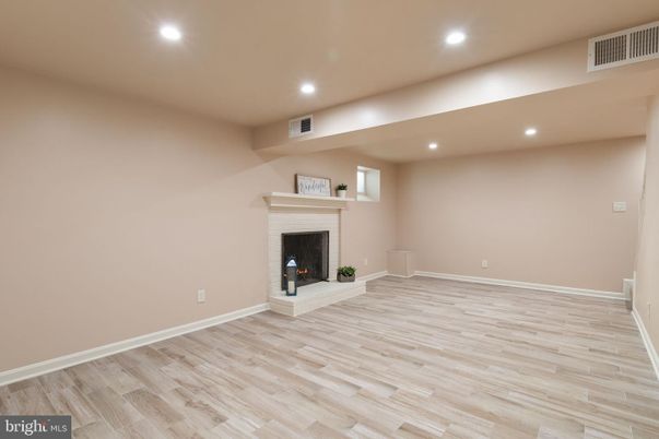 Empty room, Fireplace, Interior, Recessed Lighting, Wood Texture Flooring