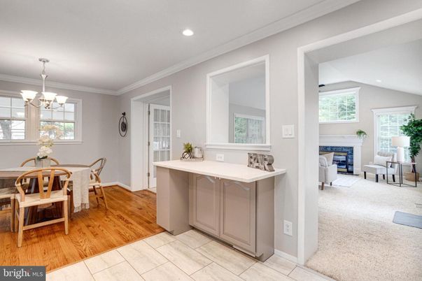 Chandelier, Dining room, Fireplace, Interior, Recessed Lighting, Wood Texture Flooring
