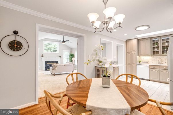 Chandelier, Dining room, Fireplace, Interior, Kitchen, Living room, Recessed Lighting, Wood Texture Flooring