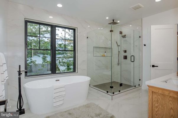 Bathroom, Free Standing Baths, Glass Shower, Interior, Marble, Marble Walls, Recessed Lighting