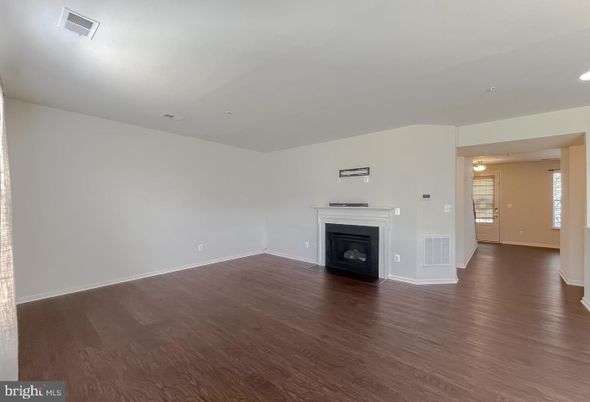 Empty room, Fireplace, Interior, Recessed Lighting, Wood Texture Flooring