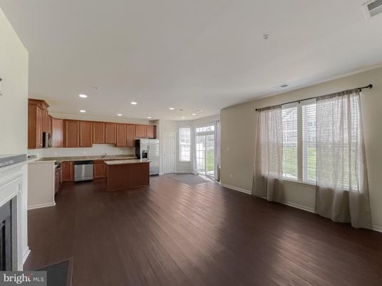 Fireplace, Interior, Kitchen, Recessed Lighting, Stainless Steel Appliances, Wood Texture Flooring