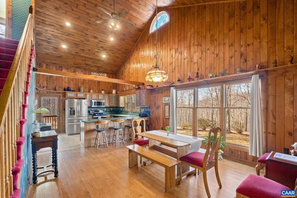Dining room, Interior, Kitchen, Pendant Lights, Recessed Lighting, Stainless Steel Appliances, Wooden Ceilings, Wood Texture Flooring, Wooden Walls