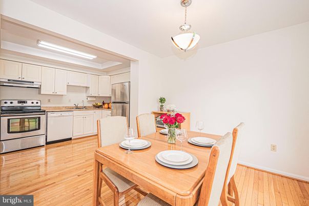 Dining room, Interior, Kitchen, Pendant Lights, Stainless Steel Appliances, Wood Texture Flooring