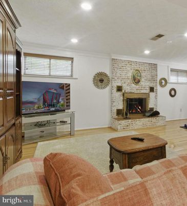 Fireplace, Interior, Recessed Lighting, Stone Walls, Wood Texture Flooring