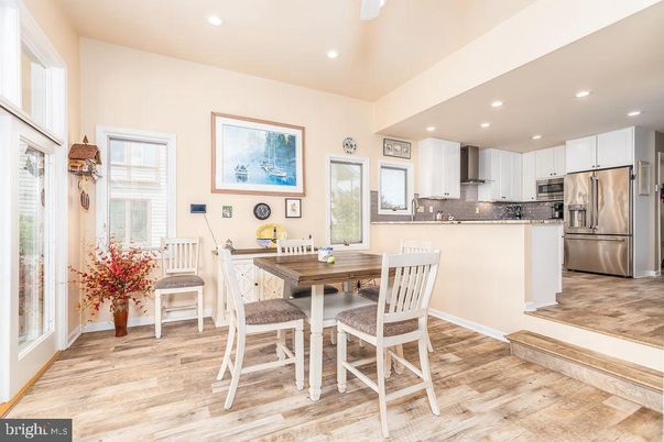 Dining room, Interior, Kitchen, Recessed Lighting, Stainless Steel Appliances, Wood Texture Flooring