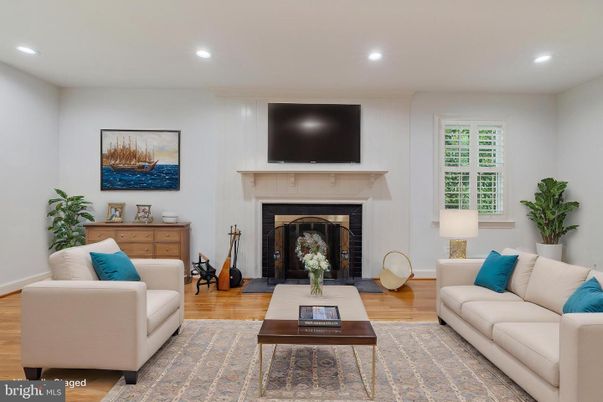 Fireplace, Fitness Equipment, Interior, Living room, Recessed Lighting, Wood Texture Flooring
