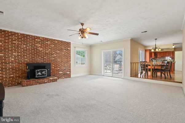 Chandelier, Dining room, Empty room, Fireplace, Interior, Pendant Lights, Stone Walls