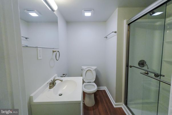 Bathroom, Glass Shower, Interior, Recessed Lighting, Wood Texture Flooring