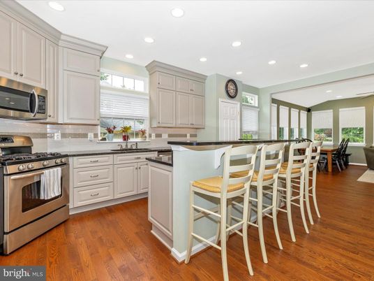 Dining room, Interior, Kitchen, Recessed Lighting, Stainless Steel Appliances, Wood Texture Flooring