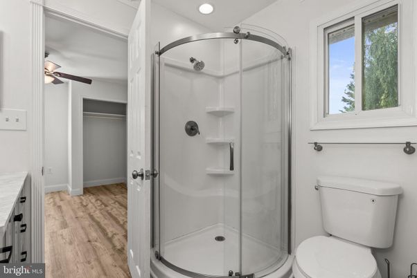 Bathroom, Glass Shower, Interior, Recessed Lighting, Wood Texture Flooring