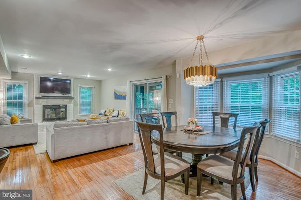Chandelier, Dining room, Fireplace, Interior, Living room, Recessed Lighting, Wood Texture Flooring