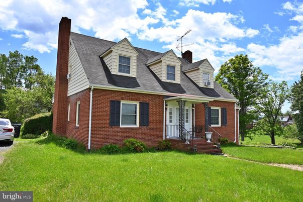 Exterior, Facade, Brick Facade, Cape Cod