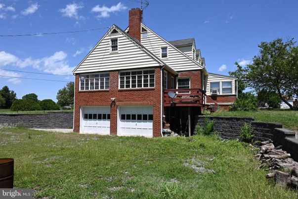 Attached, Exterior, Facade, Brick Facade, Tudor Revival