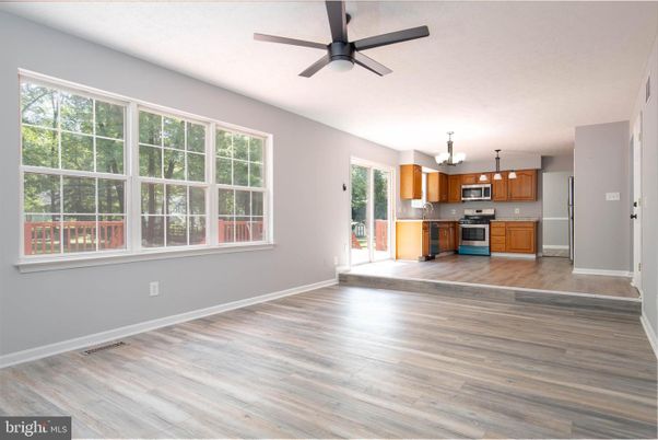 Chandelier, Empty room, Interior, Kitchen, Stainless Steel Appliances, Wood Texture Flooring
