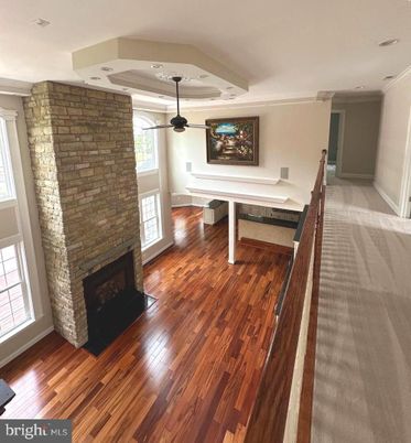 Fireplace, Interior, Recessed Lighting, Stone Walls, Wood Texture Flooring