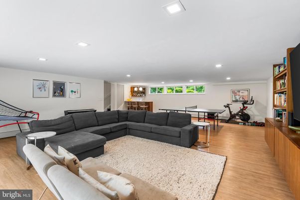 Fitness Equipment, Game Room, Interior, Living room, Recessed Lighting, Wood Texture Flooring