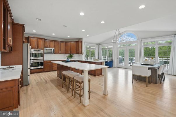 Dining room, Interior, Kitchen, Recessed Lighting, Stainless Steel Appliances, Wood Texture Flooring